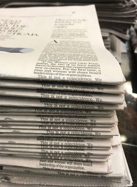 coincidental newspaper stacking